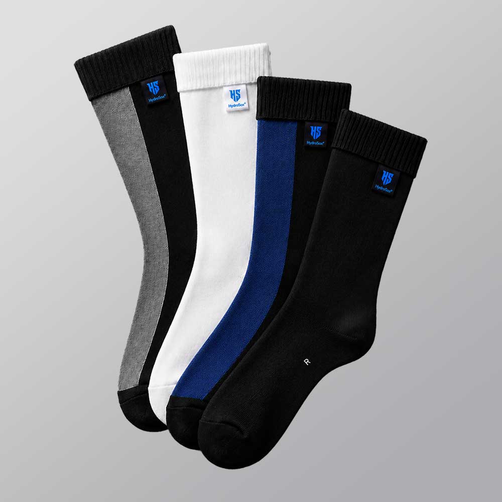 Four HydroSox colourways shown together — black, white, black with navy and black with grey.